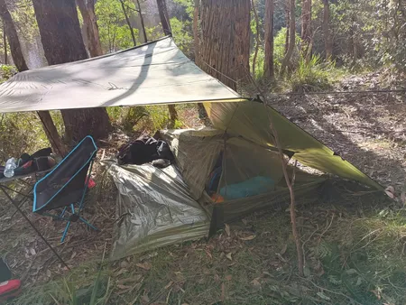 Bugnet tent set up under tarp